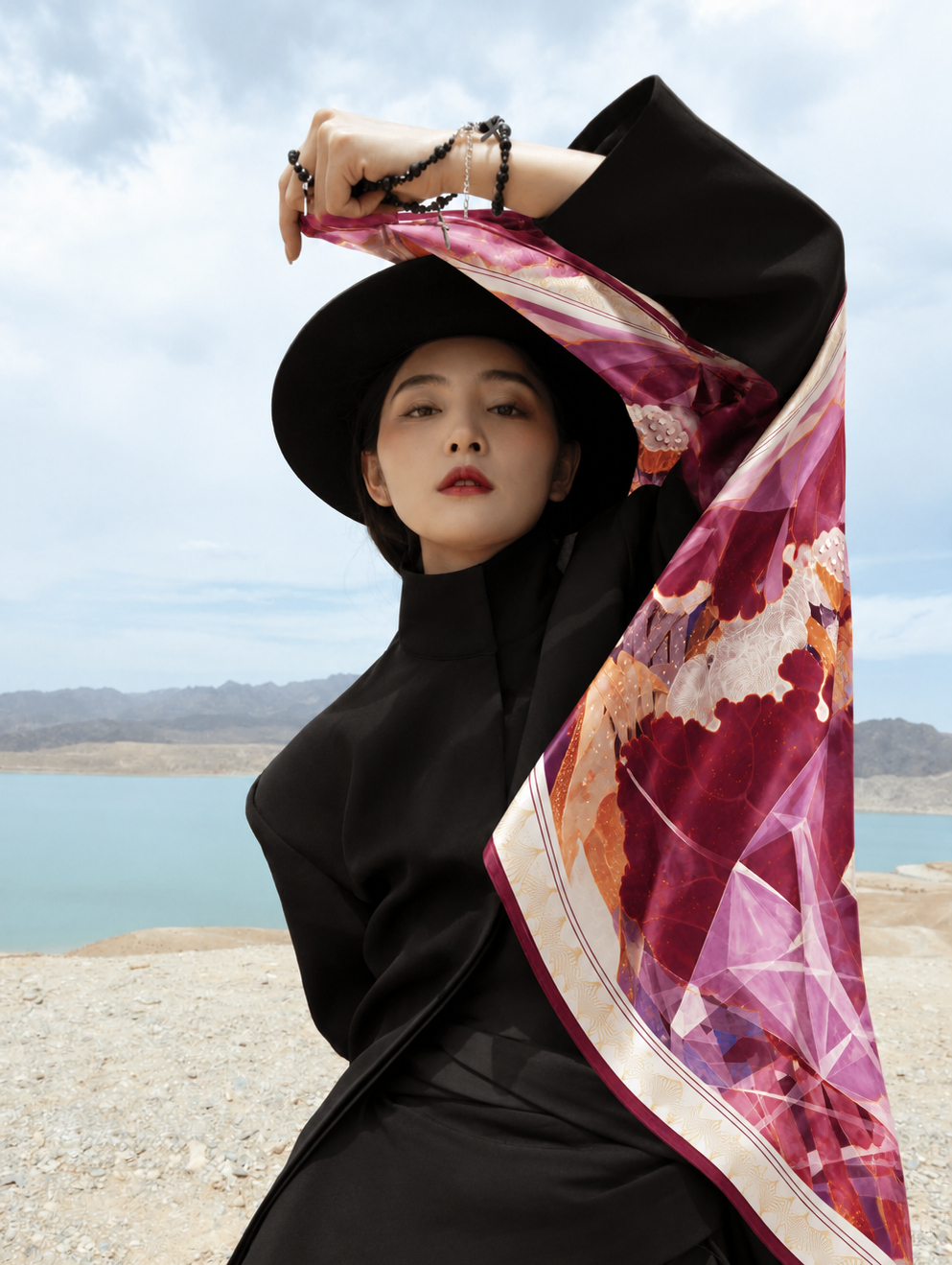 Lotus Geometry silk scarf styled with black outfit outdoors