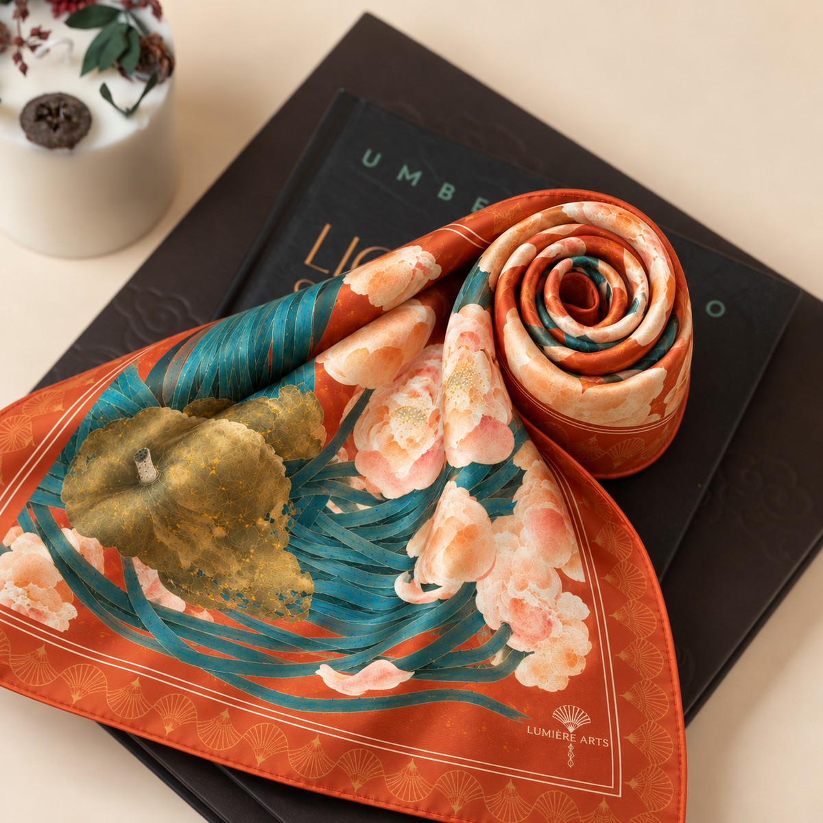 Golden Lotus silk scarf rolled for presentation